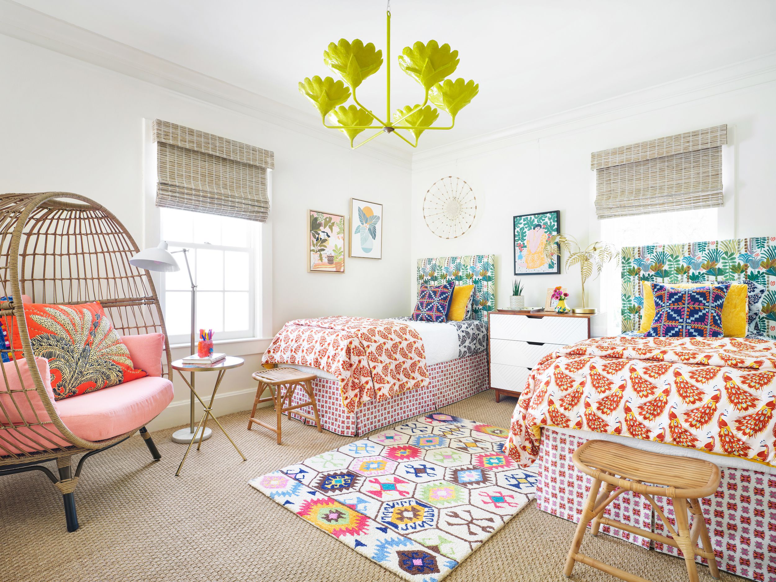 Vibrant bedroom with twin beds and a chair