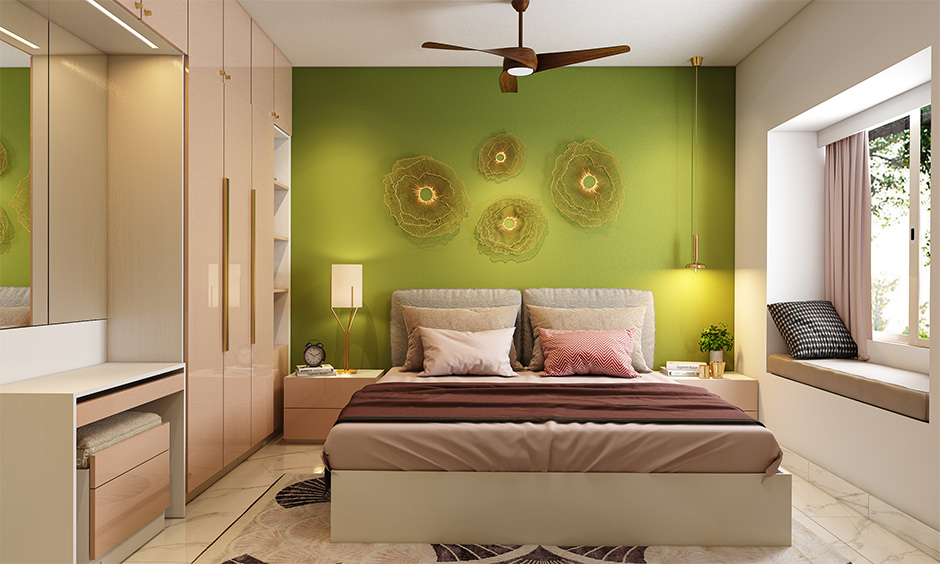 Cozy bedroom with a vibrant green wall and a comfortable bed