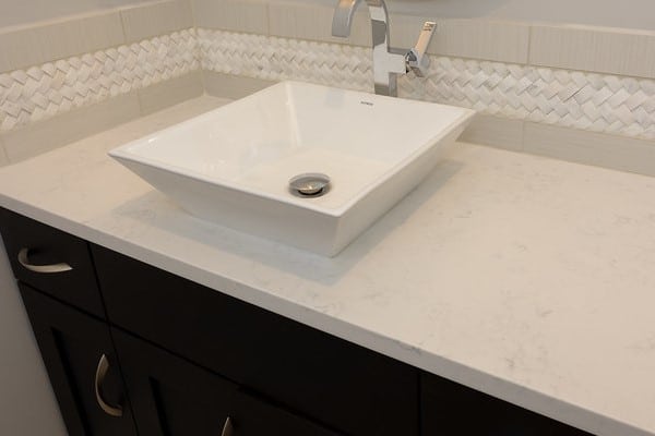 A Bathroom Vanity with Quartz Countertop