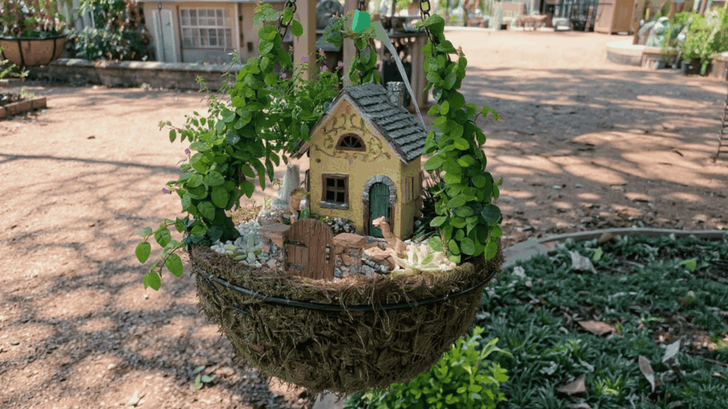fairy garden in a hanging planter