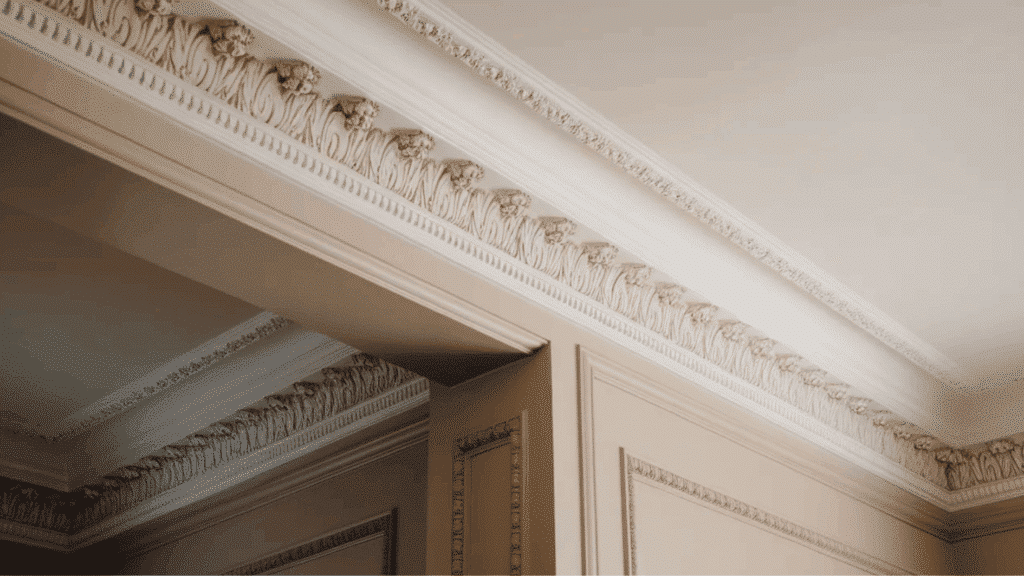 intricate moulding on ceiling with borders to enhance victorian theme