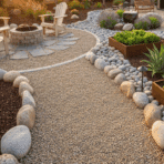 scenic view of a pea gravel walkway winding through a garden, bordered by natural stone edging