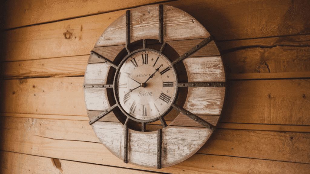 vintage wooden wall clock with Roman numerals and rustic wooden walls