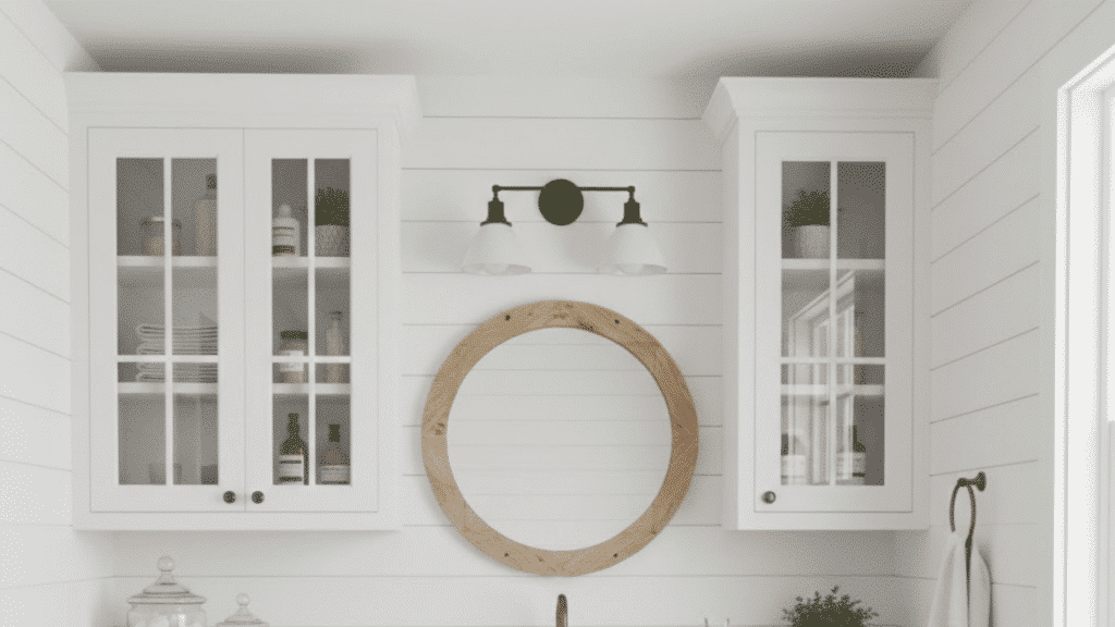 white bathroom with a farmhouse sink, wooden mirror, and organized shelves