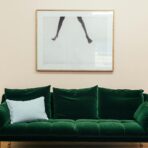 Apartment with a stylish couch and creative decorative elements.